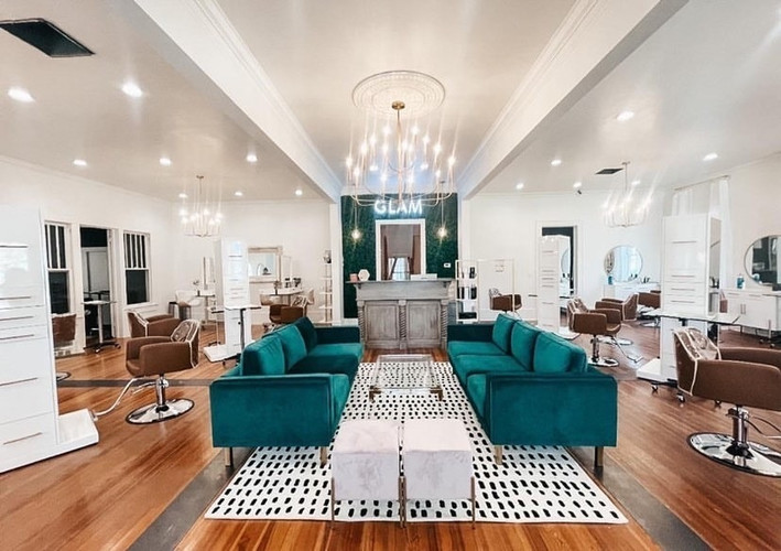 Full-service luxury salon floor with premium seating